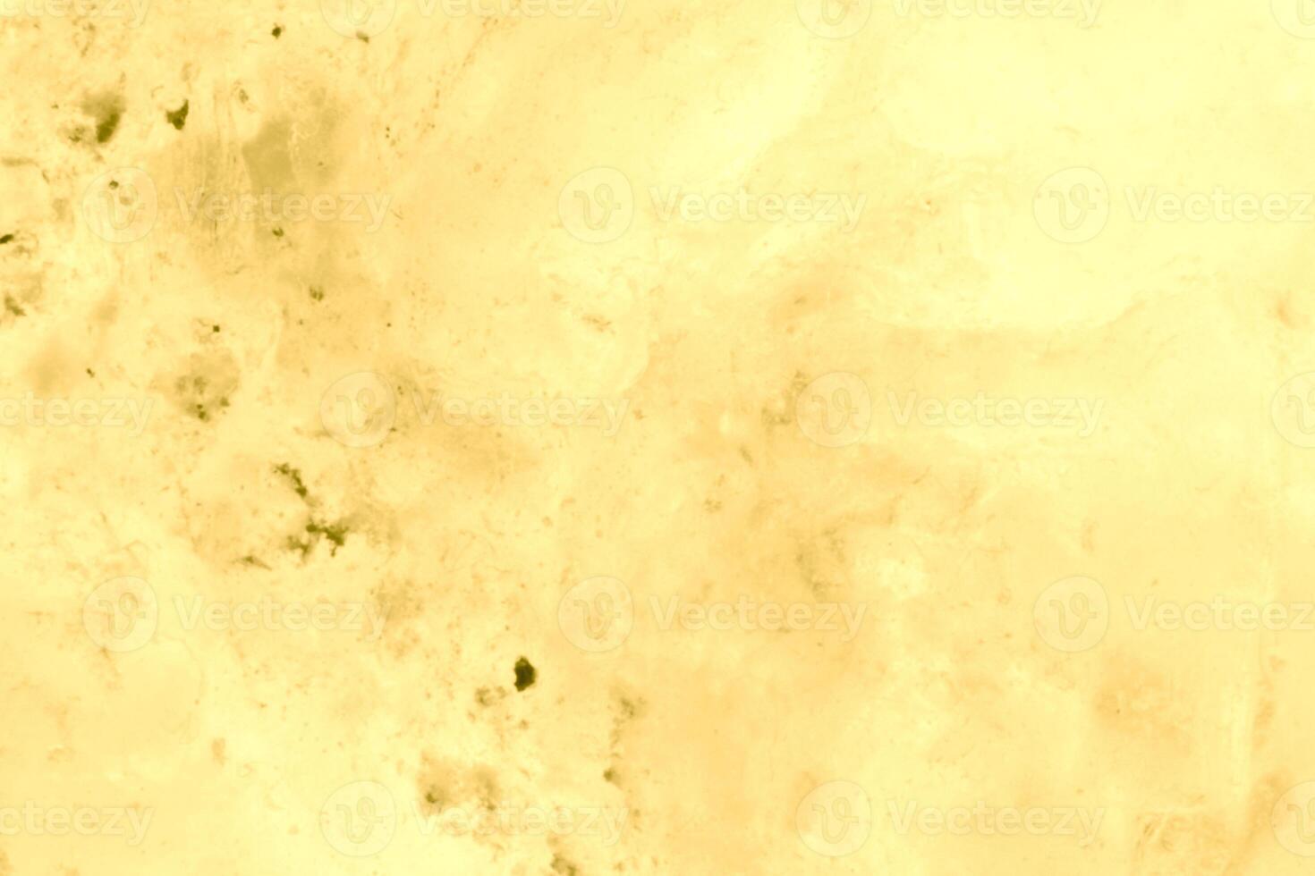 Texture of golden decorative plaster or concrete. Abstract gold grunge background. photo