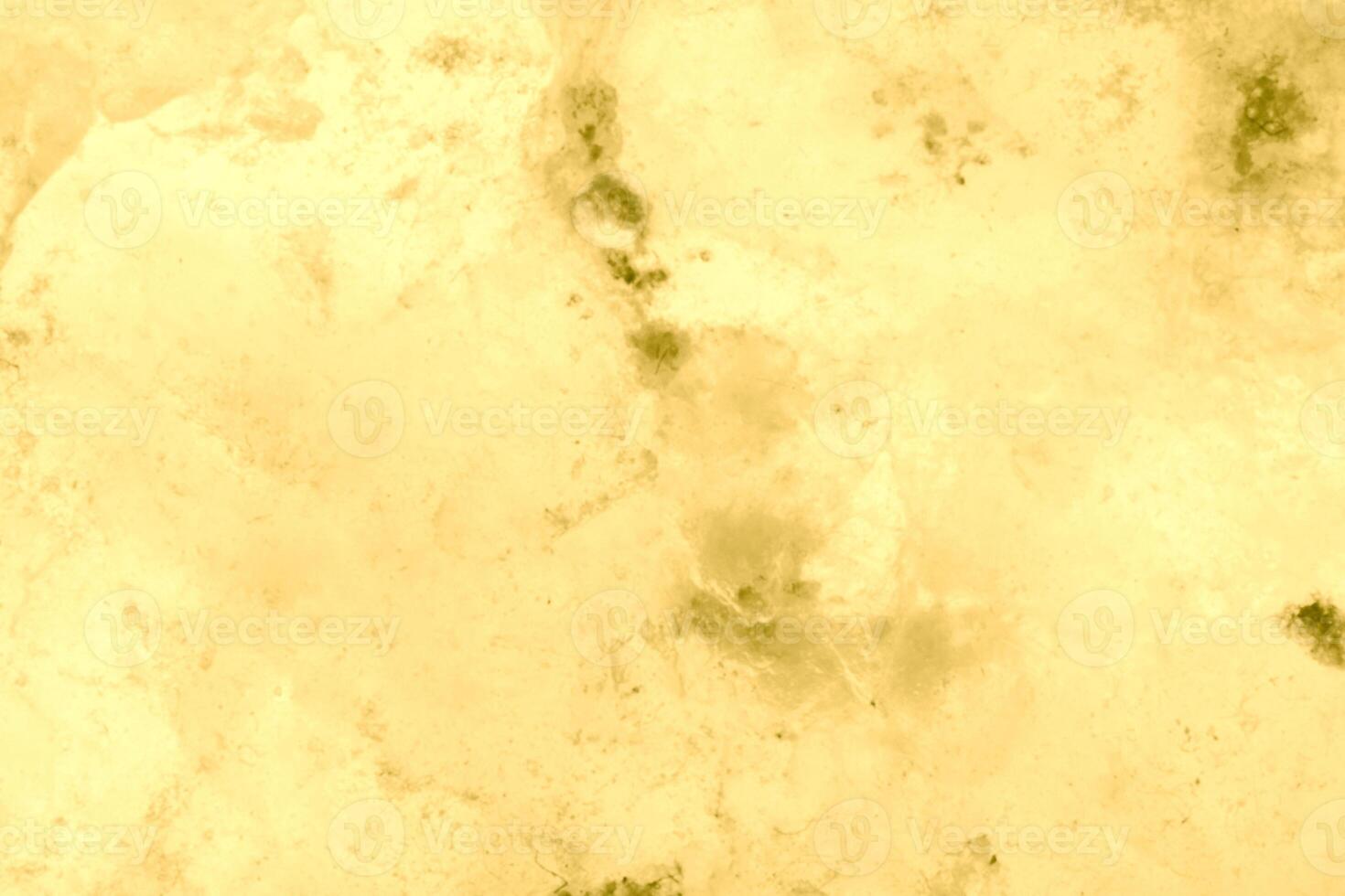 Texture of golden decorative plaster or concrete. Abstract gold grunge background. photo