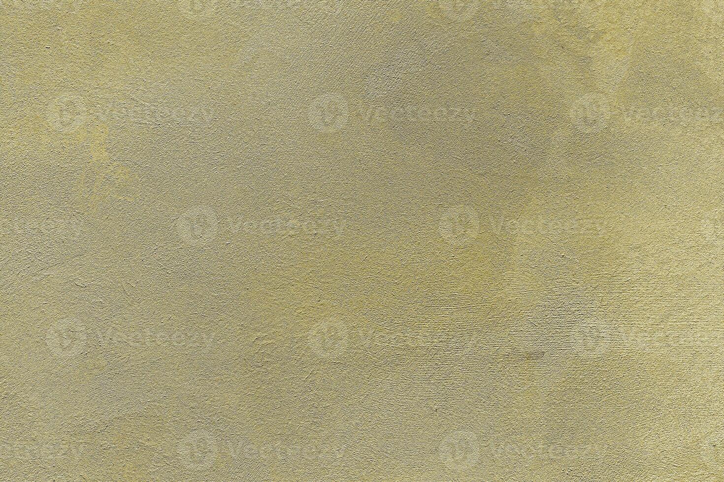 Texture of golden decorative plaster or concrete. Abstract gold grunge background. photo