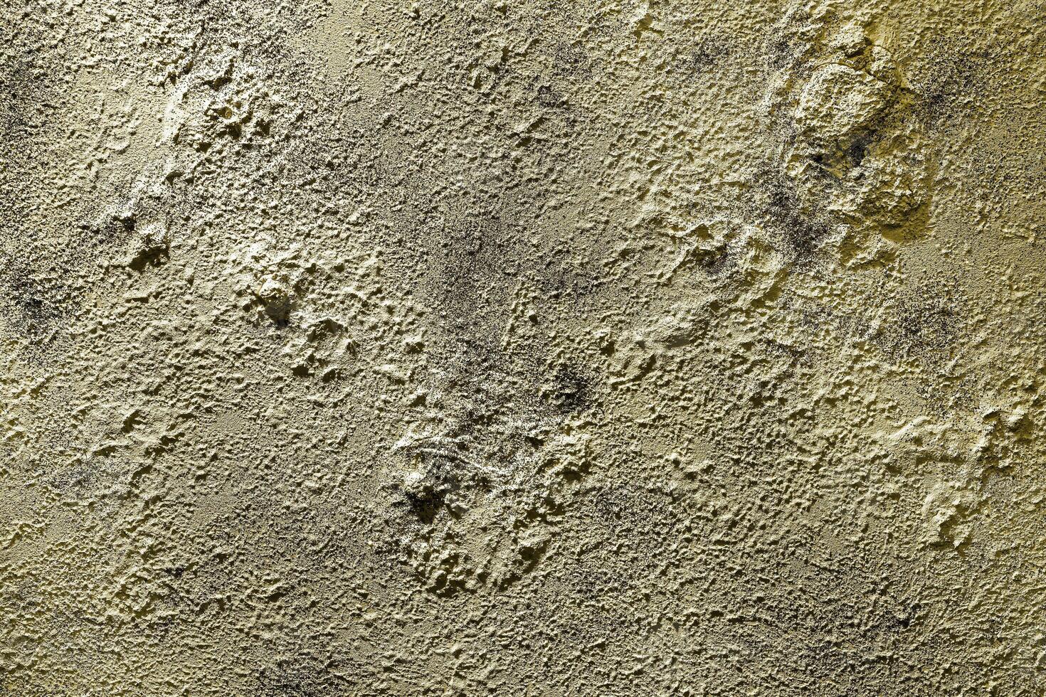 Texture of golden decorative plaster or concrete. Abstract gold grunge background. photo