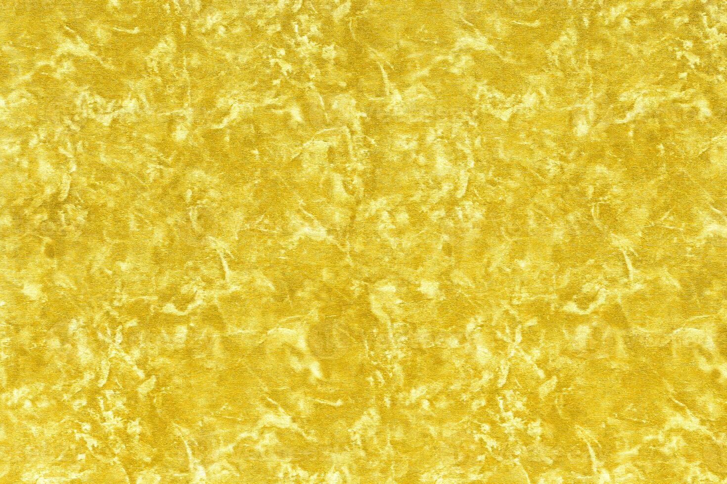 Texture of golden decorative plaster or concrete. Abstract gold grunge background. photo