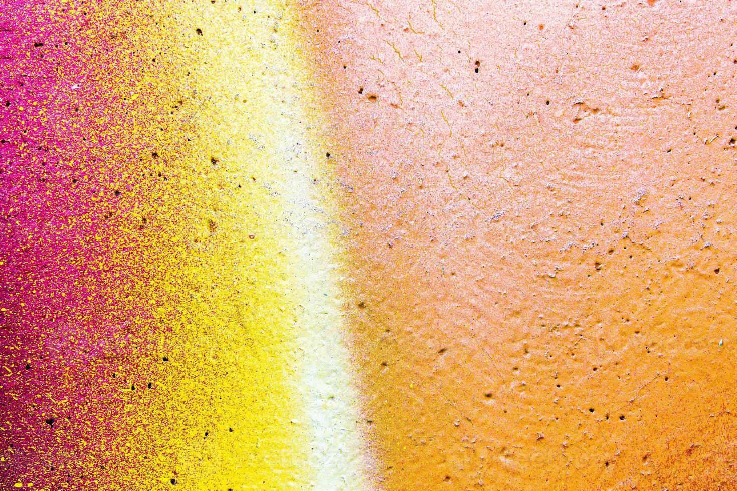 Colorful graffiti painted on a wall. Abstract urban background. Spray painting art. photo