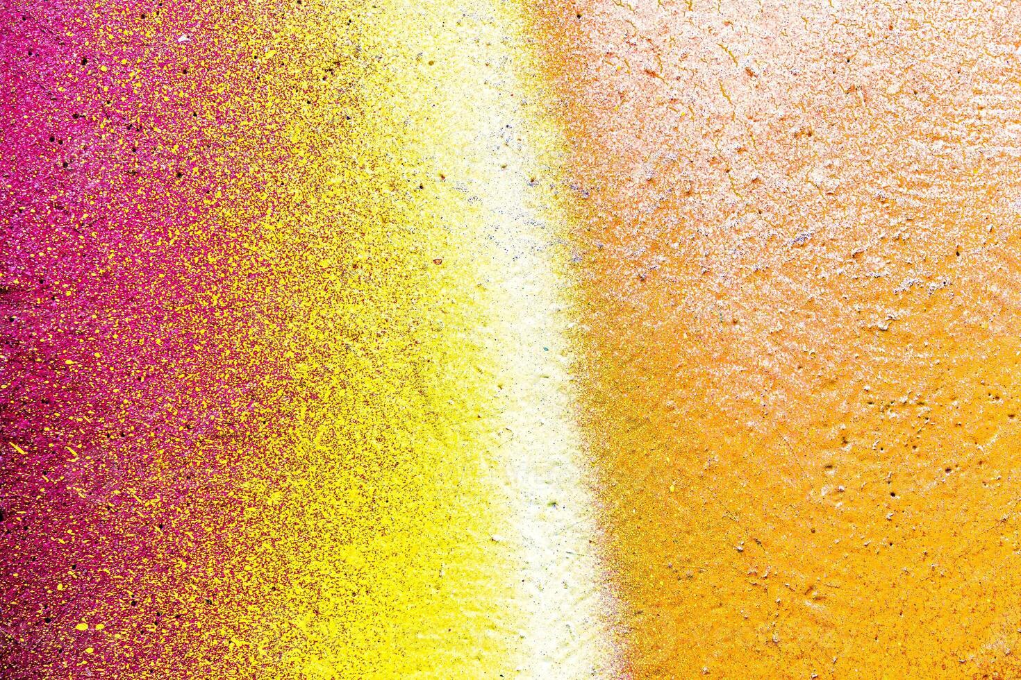 Colorful graffiti painted on a wall. Abstract urban background. Spray painting art. photo