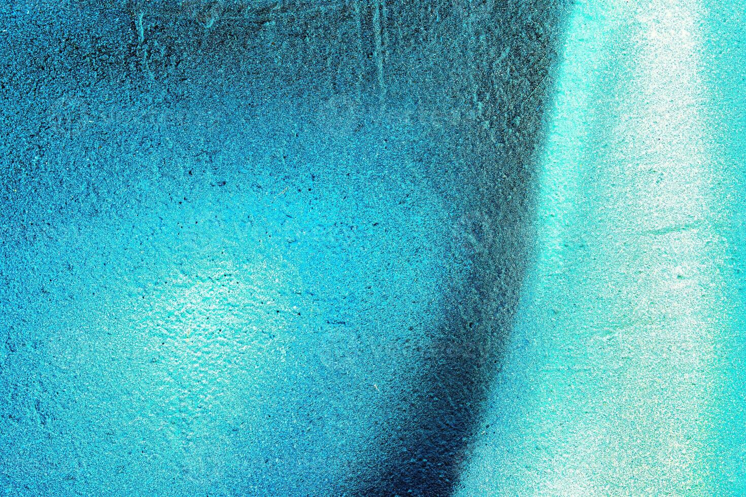 Colorful graffiti painted on a wall. Abstract urban background. Spray painting art. photo