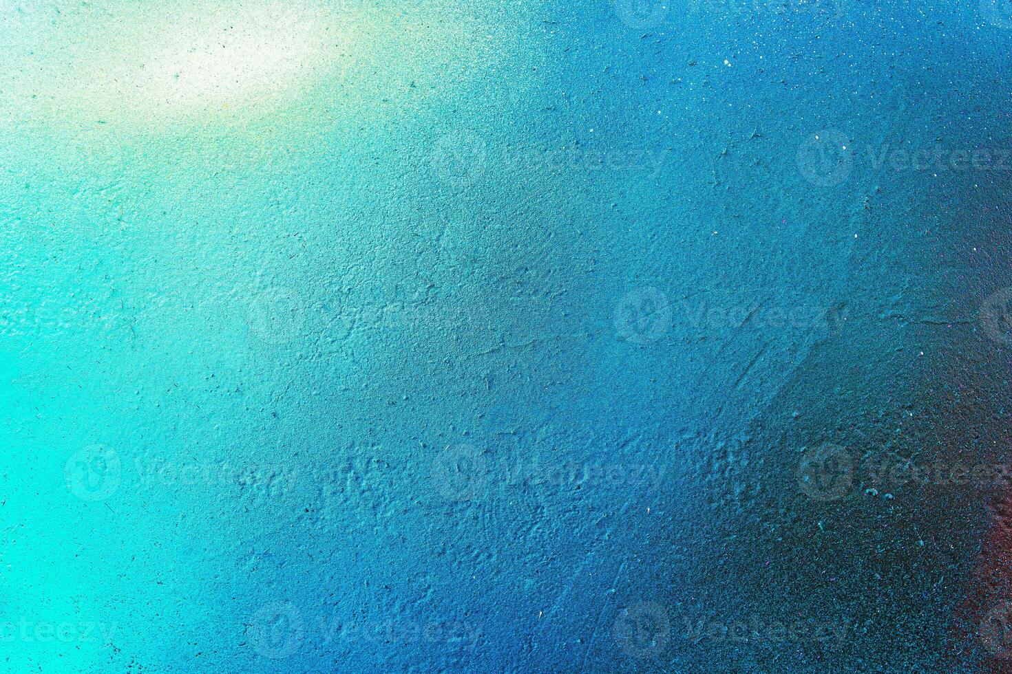 Colorful graffiti painted on a wall. Abstract urban background. Spray painting art. photo