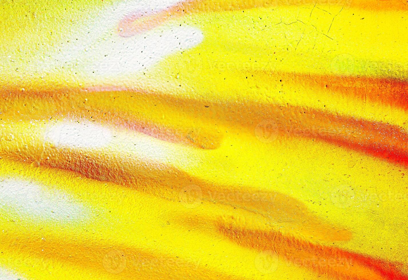 Colorful graffiti painted on a wall. Abstract urban background. Spray painting art. photo