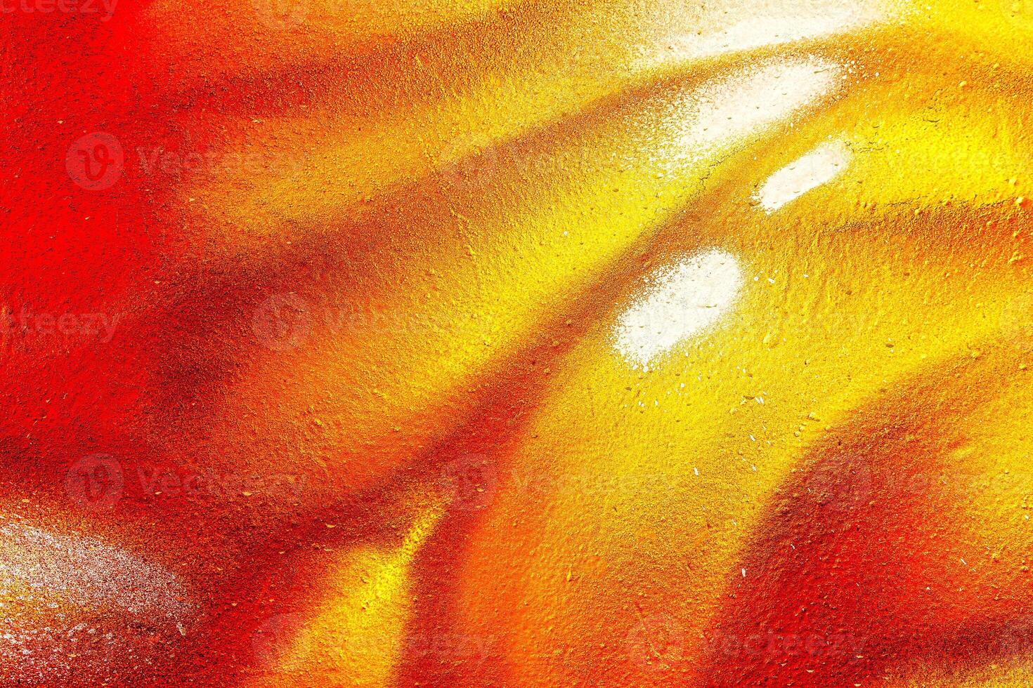 Colorful graffiti painted on a wall. Abstract urban background. Spray painting art. photo