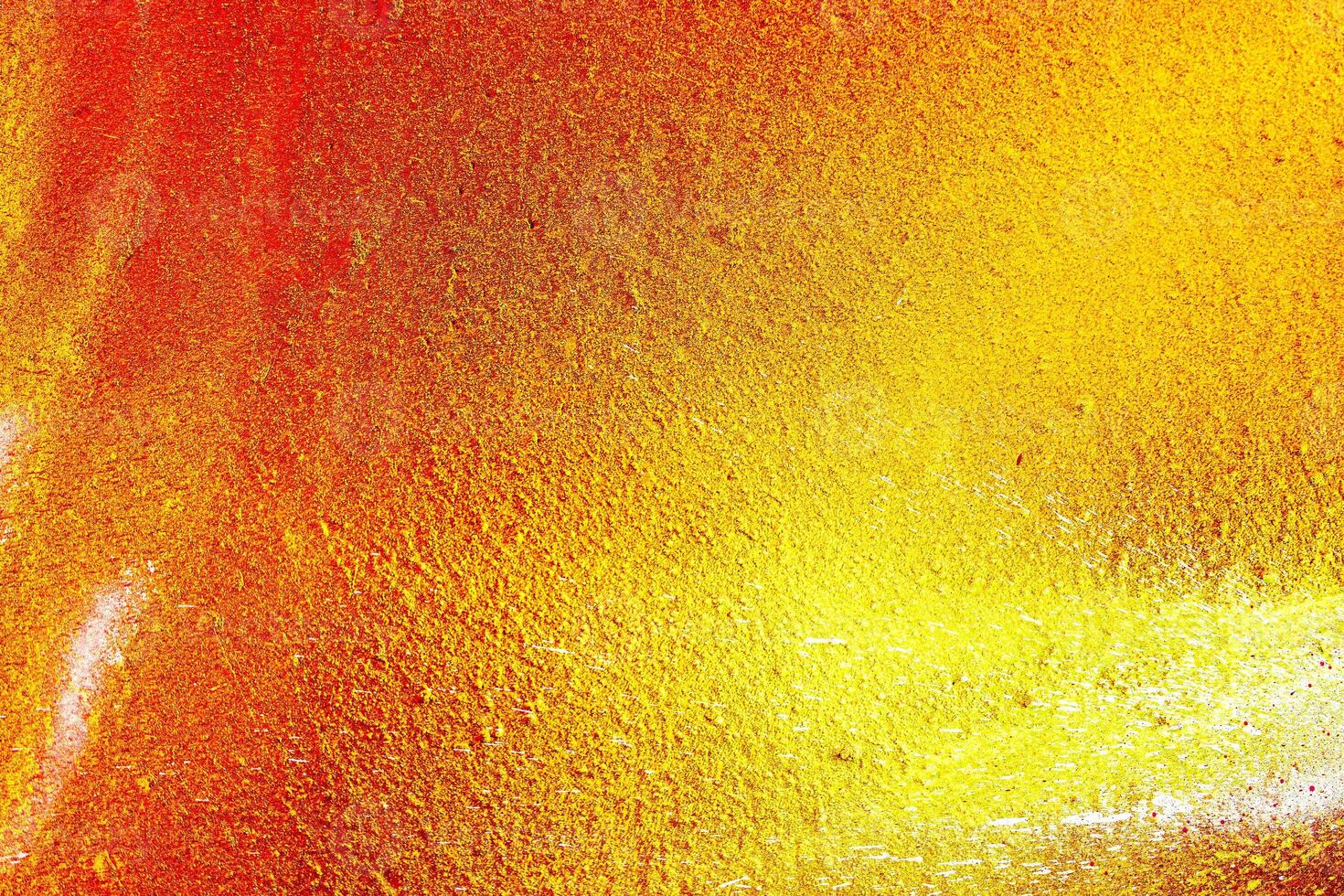 Colorful graffiti painted on a wall. Abstract urban background. Spray painting art. photo