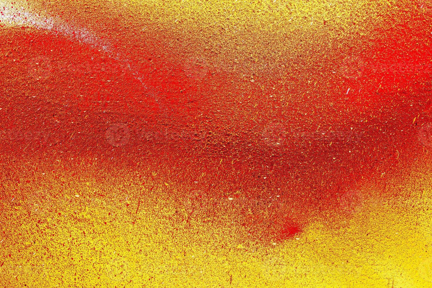 Colorful graffiti painted on a wall. Abstract urban background. Spray painting art. photo