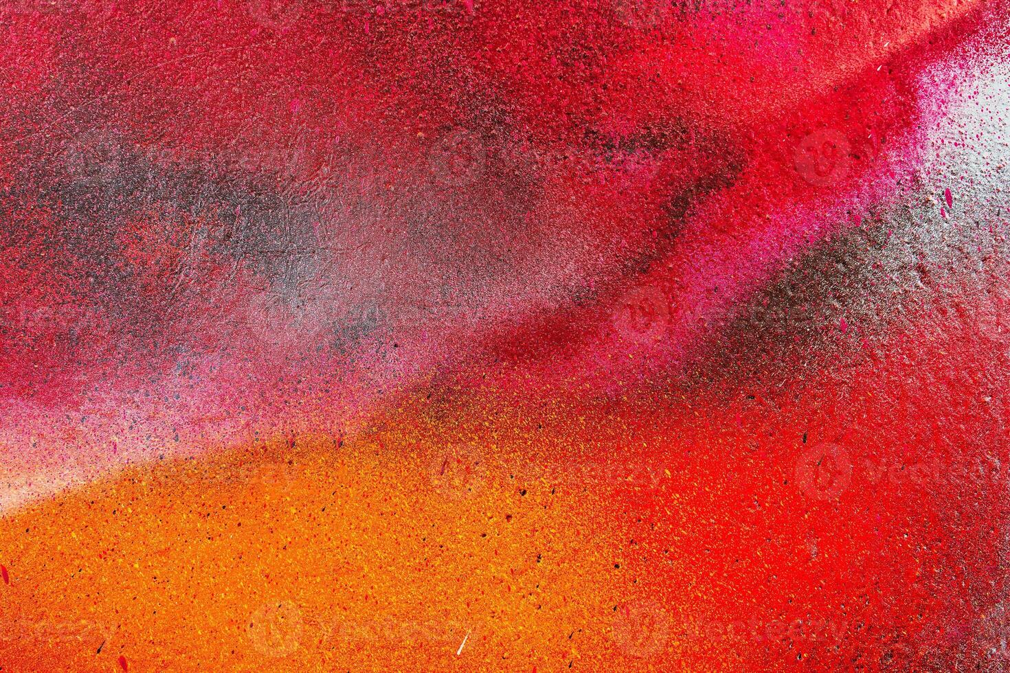 Colorful graffiti painted on a wall. Abstract urban background. Spray painting art. photo
