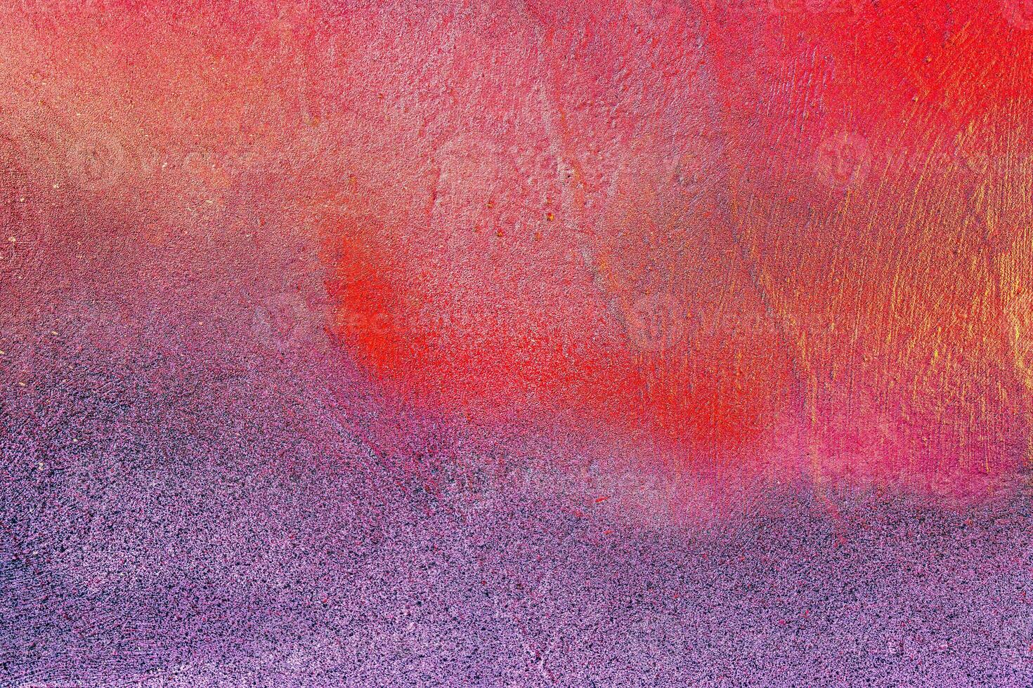 Colorful graffiti painted on a wall. Abstract urban background. Spray painting art. photo