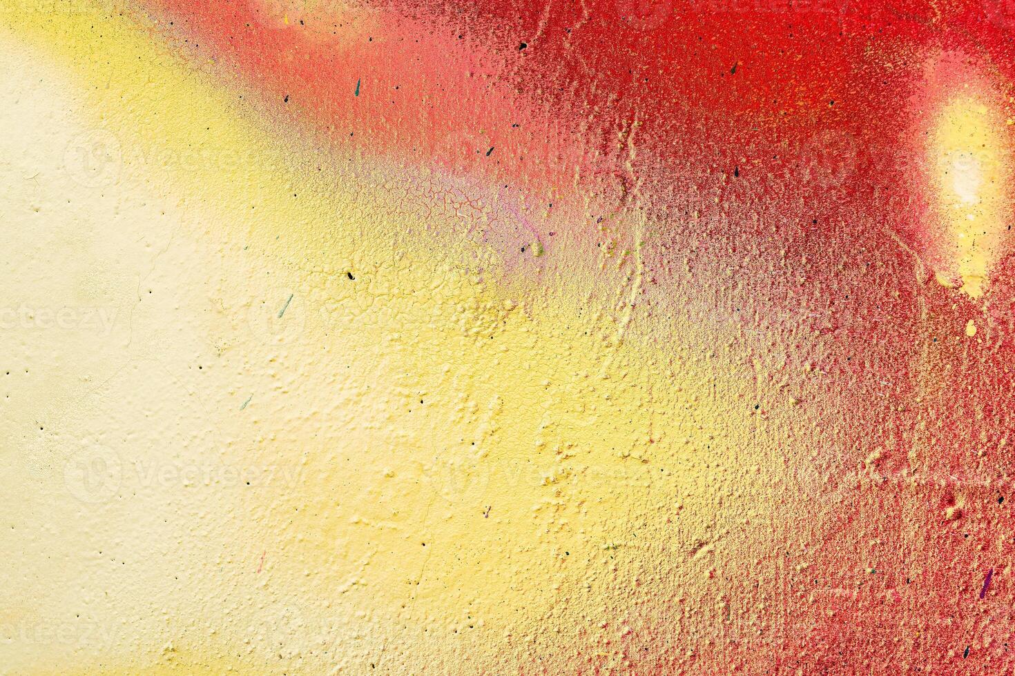 Colorful graffiti painted on a wall. Abstract urban background. Spray painting art. photo