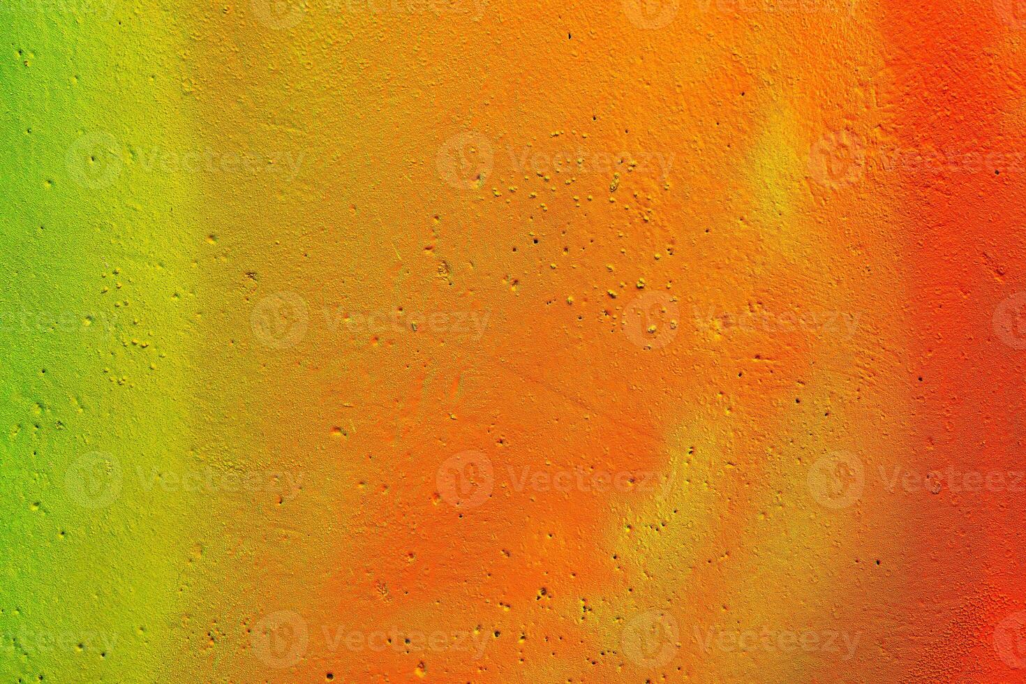 Colorful graffiti painted on a wall. Abstract urban background. Spray painting art. photo