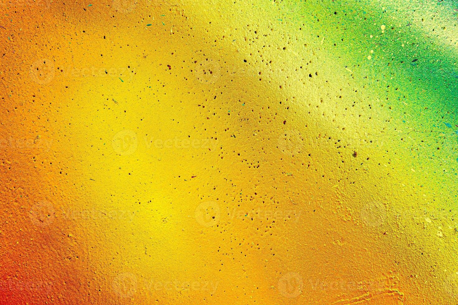 Colorful graffiti painted on a wall. Abstract urban background. Spray painting art. photo