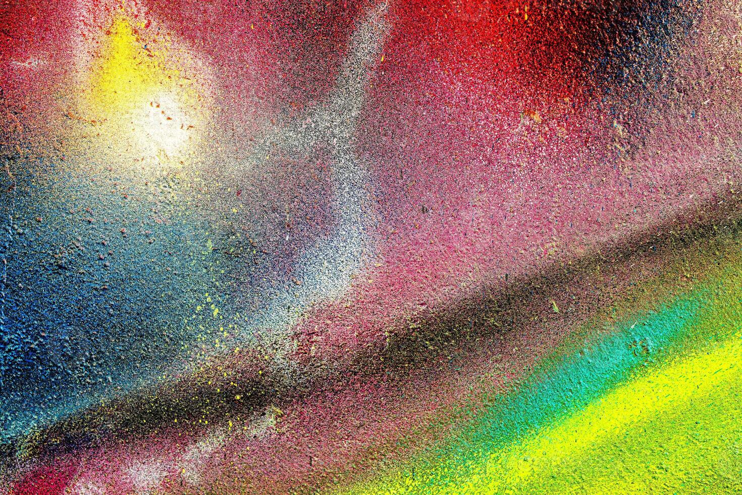 Colorful graffiti painted on a wall. Abstract urban background. Spray painting art. photo