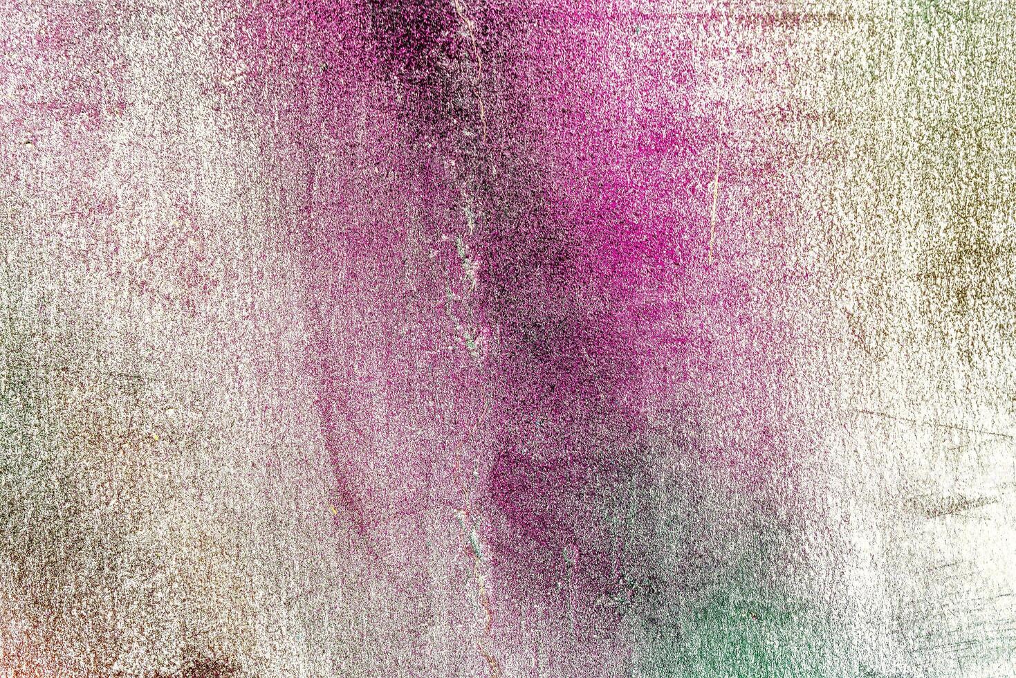 Colorful graffiti painted on a wall. Abstract urban background. Spray painting art. photo