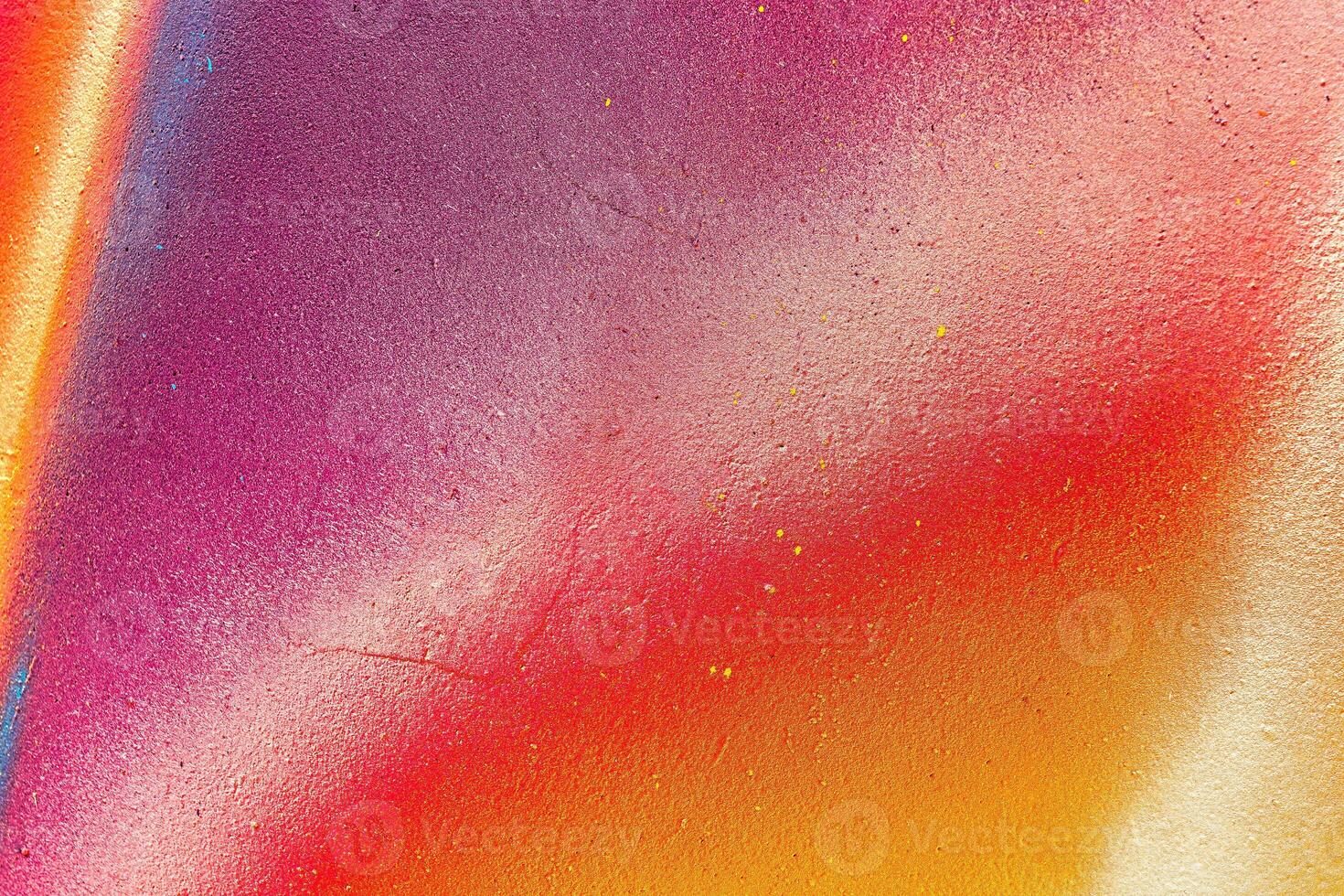 Colorful graffiti painted on a wall. Abstract urban background. Spray painting art. photo