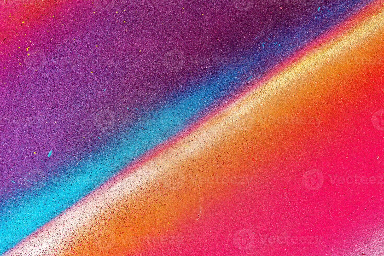 Colorful graffiti painted on a wall. Abstract urban background. Spray painting art. photo