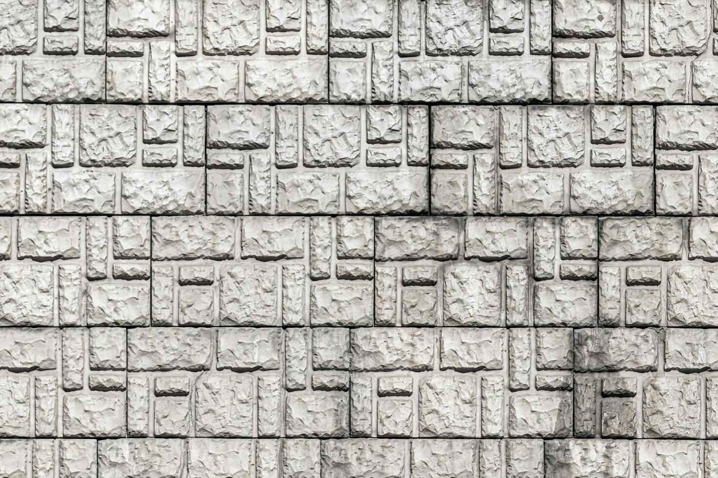 Texture of a decorative brick-like tiles. Abstract background for design. photo