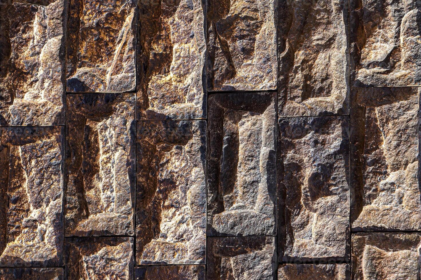 Texture of a decorative brick-like tiles. Abstract background for design. photo