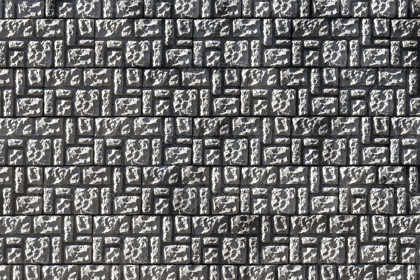 Texture of a decorative brick-like tiles. Abstract background for design. photo