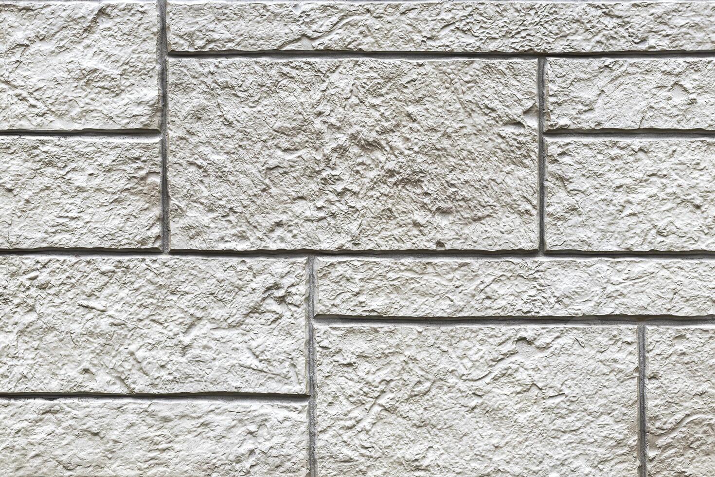 Texture of a decorative brick-like tiles. Abstract background for design. photo