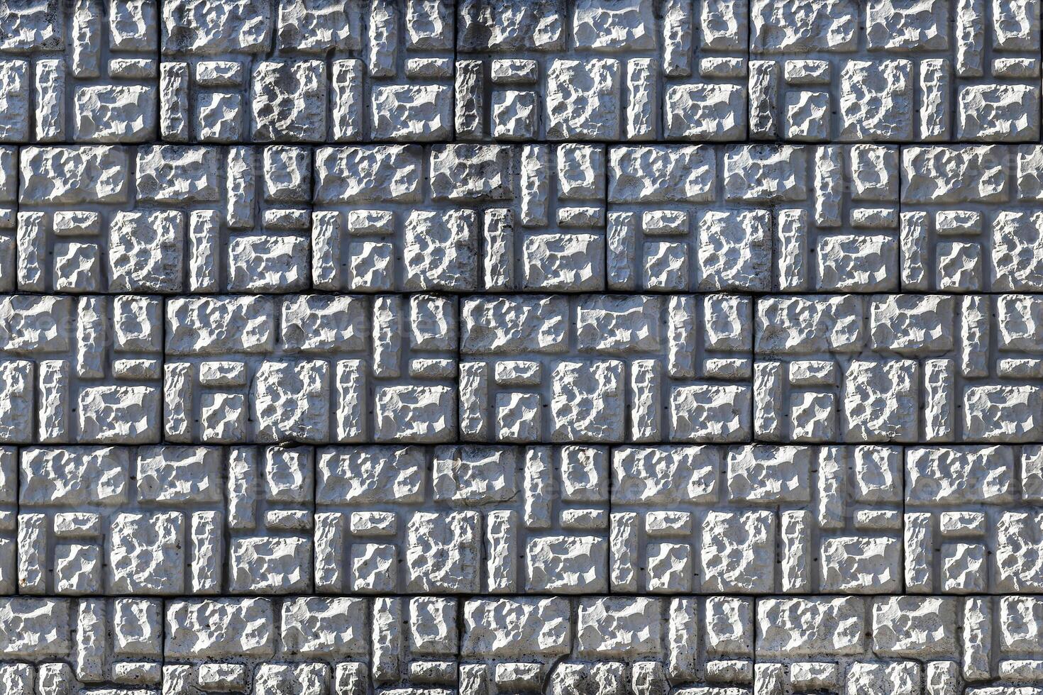Texture of a decorative brick-like tiles. Abstract background for design. photo