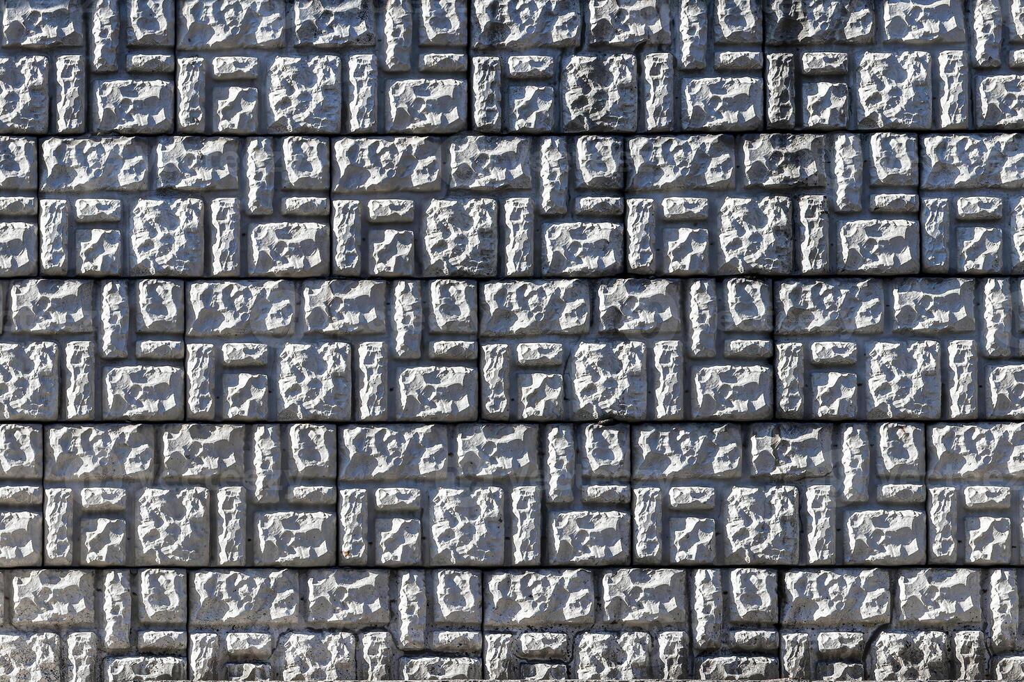 Texture of a decorative brick-like tiles. Abstract background for design. photo