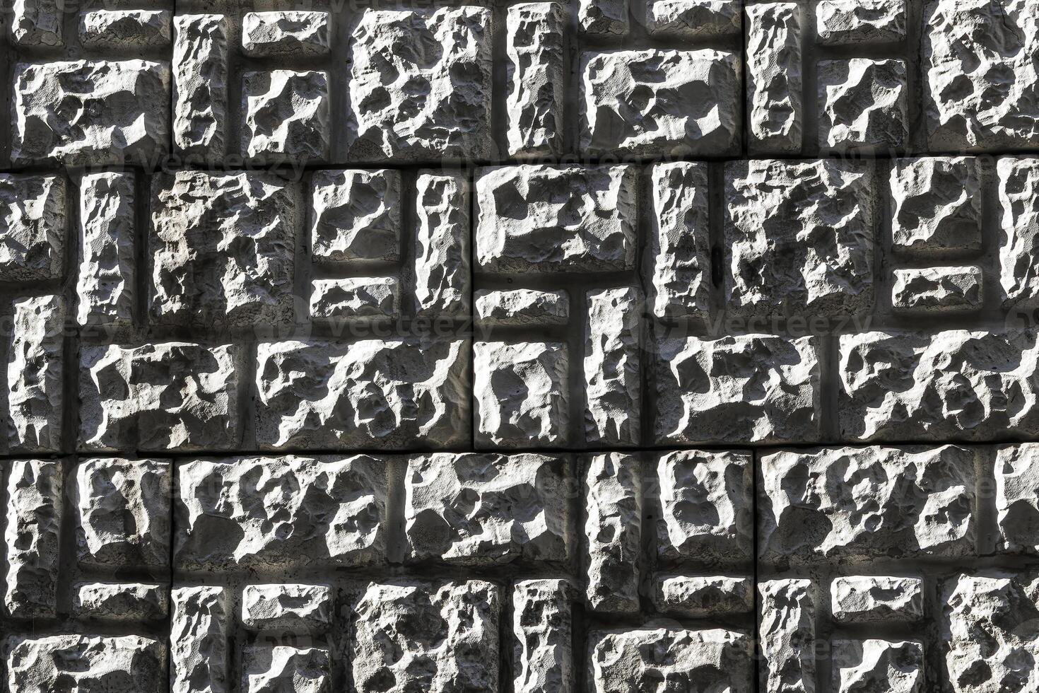 Texture of a decorative brick-like tiles. Abstract background for design. photo