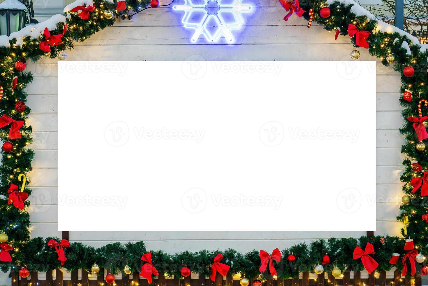 Christmas or New Year's market house in a European city decorated with toys and garlands at night with copy space for a text. Mock up. photo
