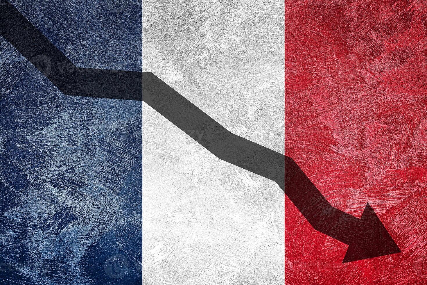 Arrow down on the background of the France flag. The concept of economic recession, depression and crisis. photo
