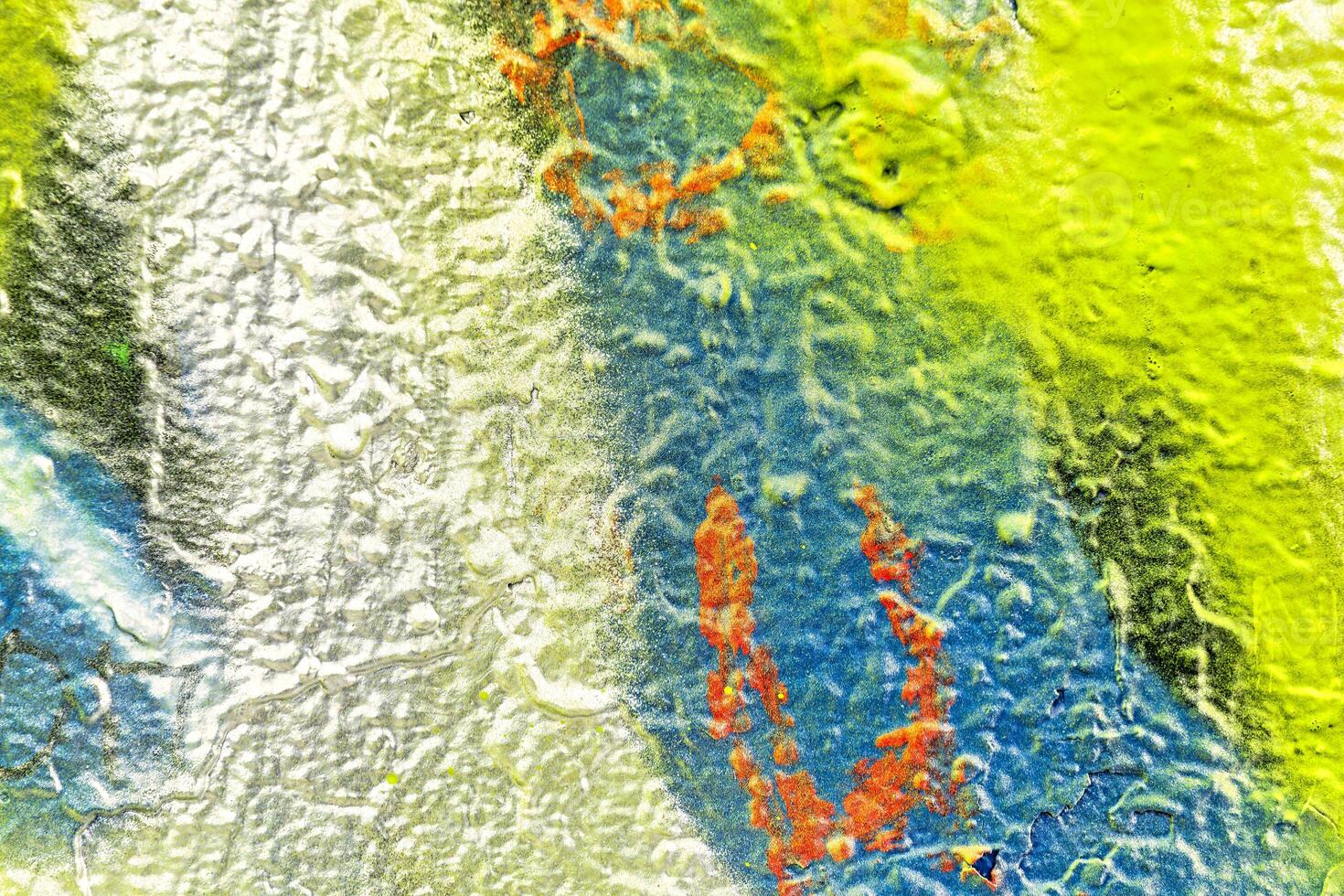 Colorful graffiti painted on a wall. Abstract urban background. Spray painting art. photo