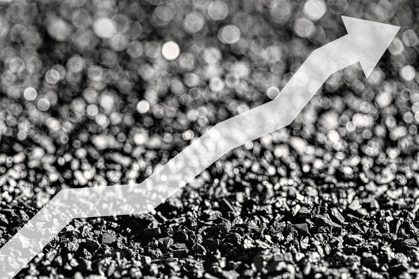 Arrow up on coal background. The concept of price growth, mining, import, export, production or sales of coal. photo