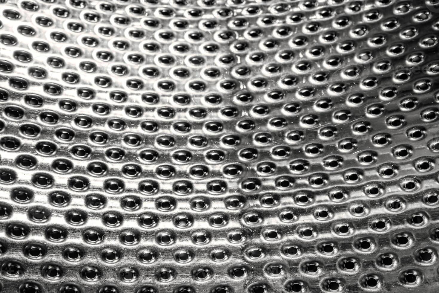 Texture of stainless steel washing machine drum. photo