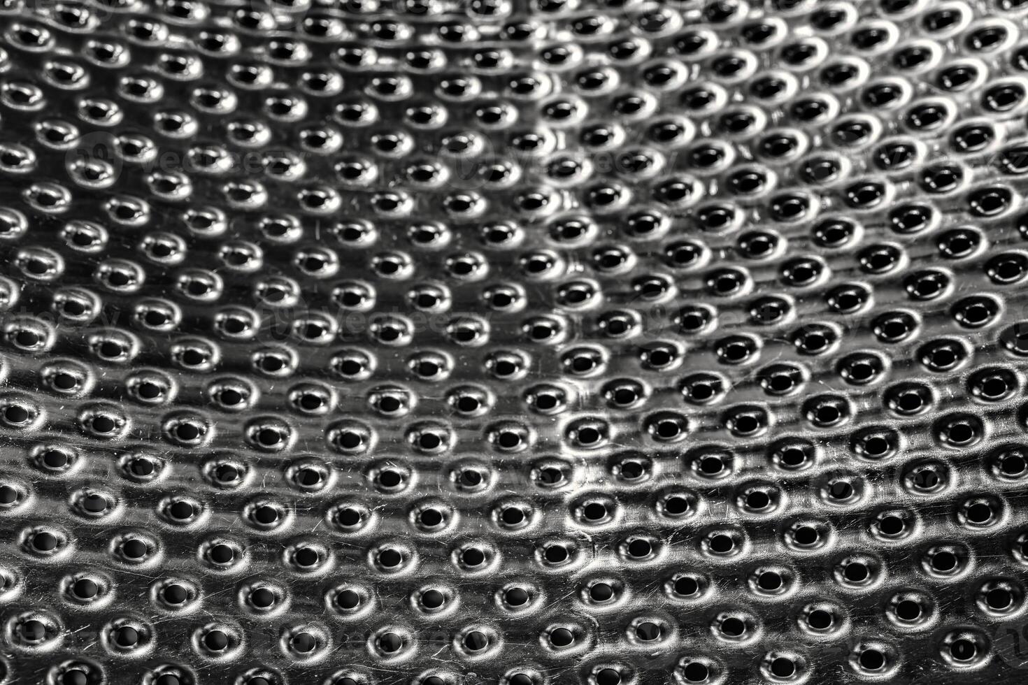Texture of stainless steel washing machine drum. photo