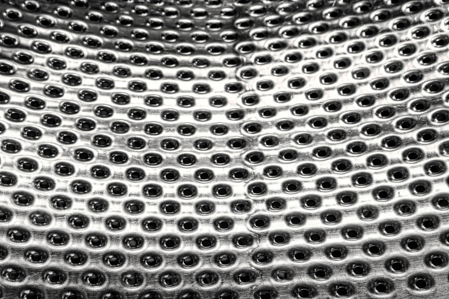 Texture of stainless steel washing machine drum. photo