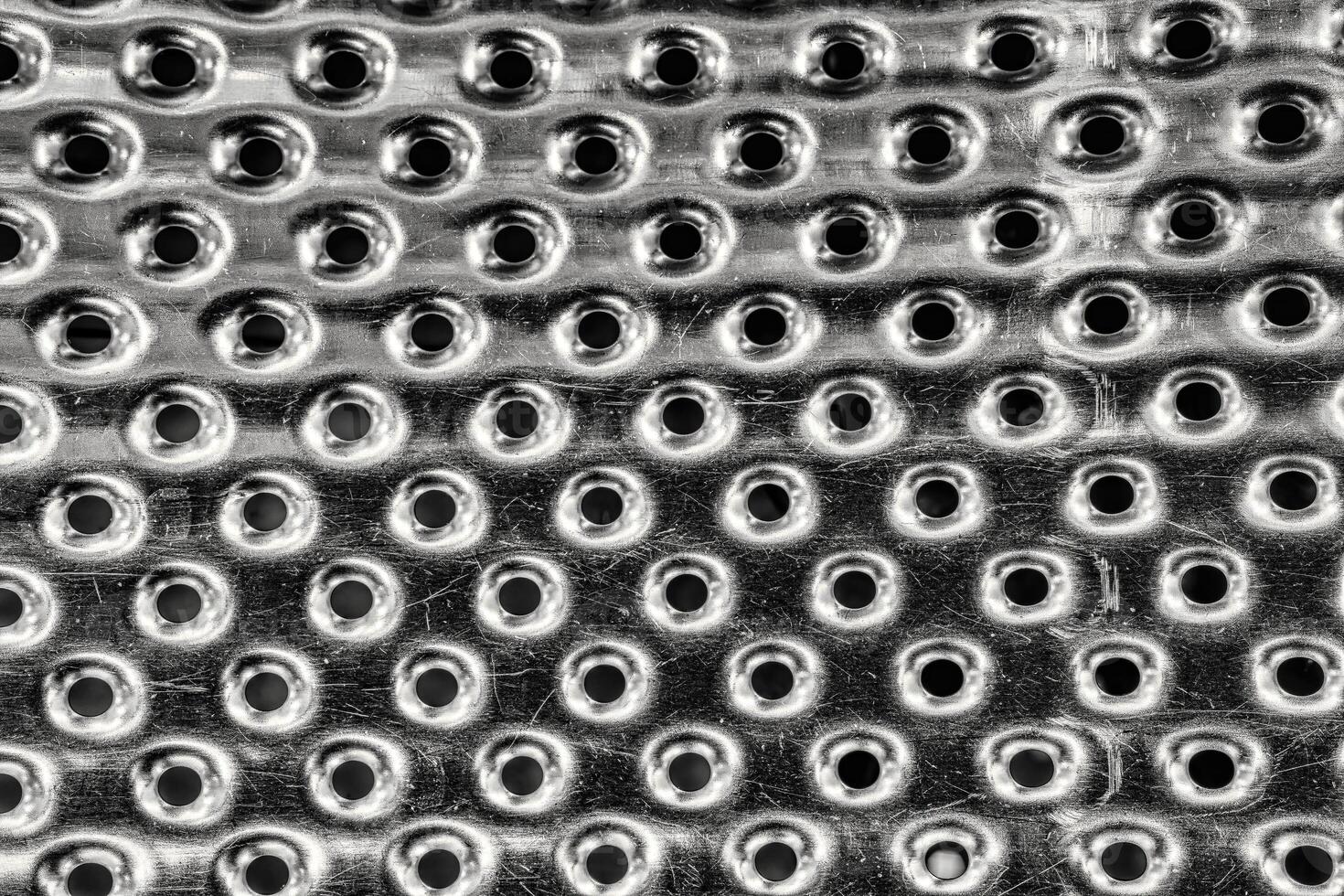 Texture of stainless steel washing machine drum. photo