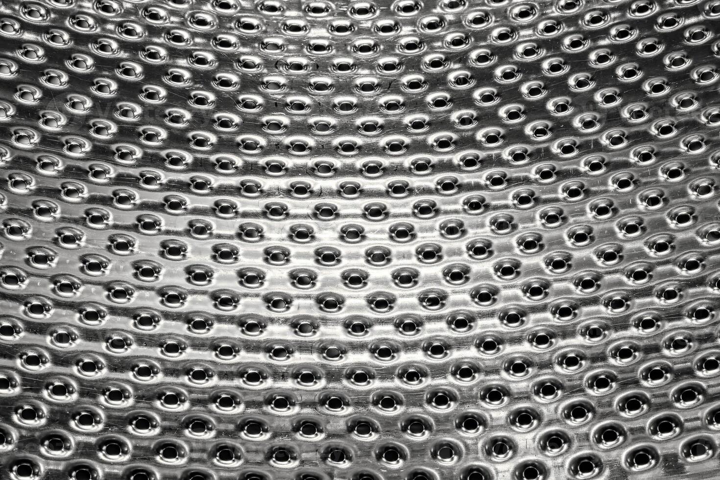 Texture of stainless steel washing machine drum. photo