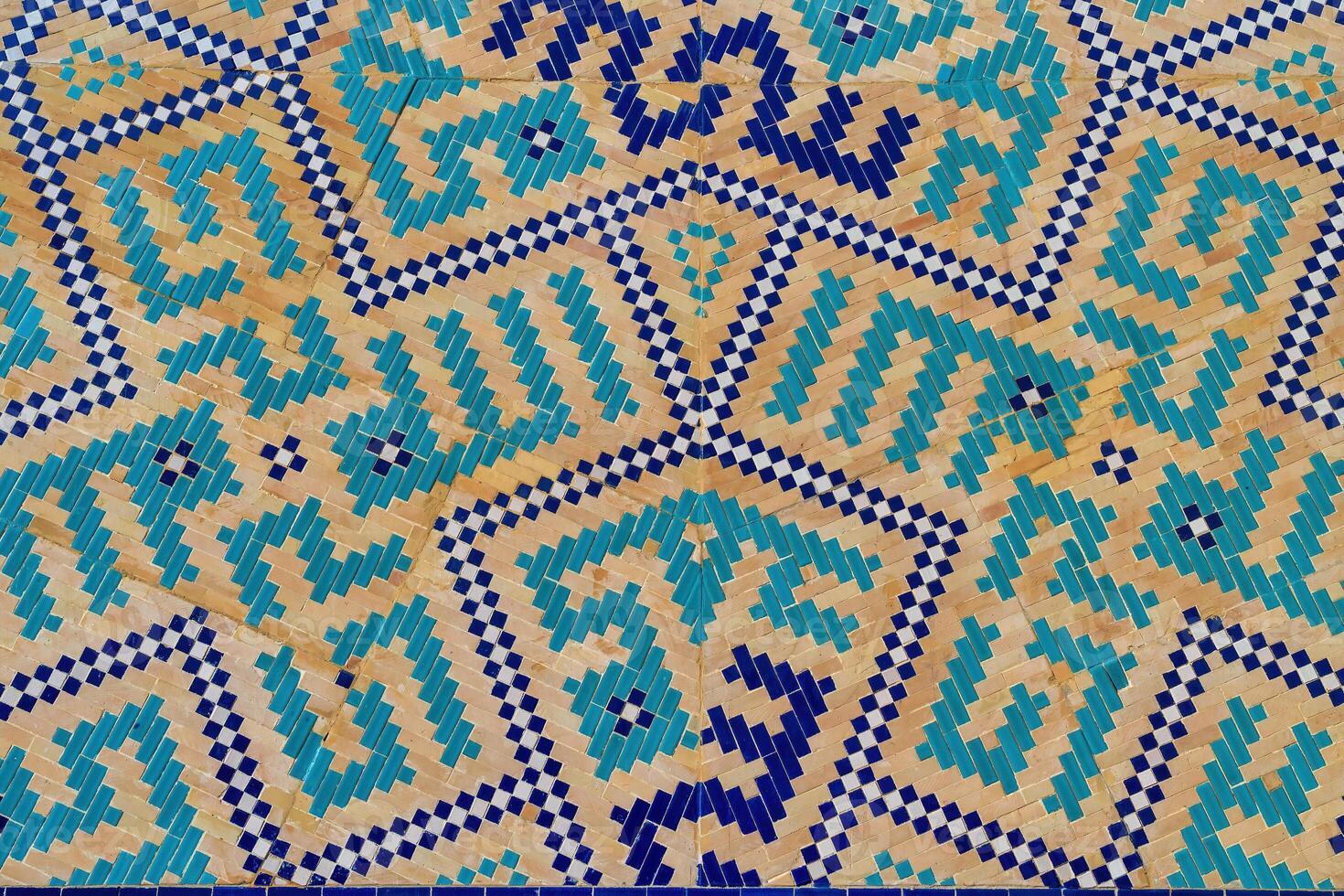 Geometric traditional Islamic ornament. Fragment of a ceramic mosaic. photo