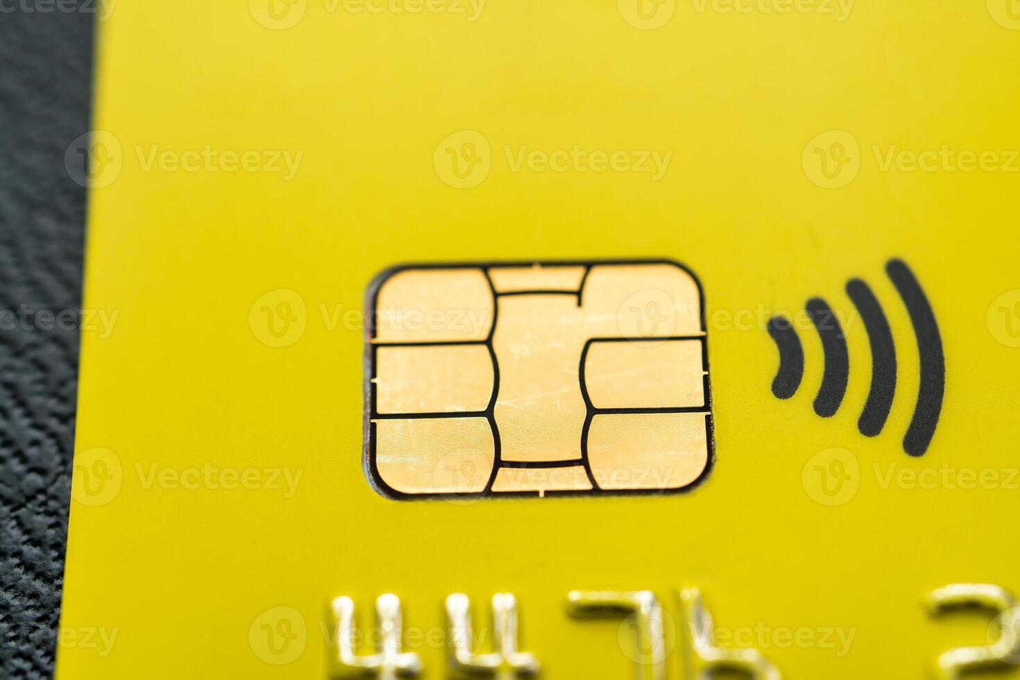 Close-up shot of a debit or credit card with a chip. photo