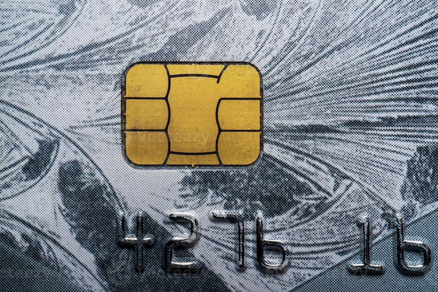 Close-up shot of a debit or credit card with a chip. photo