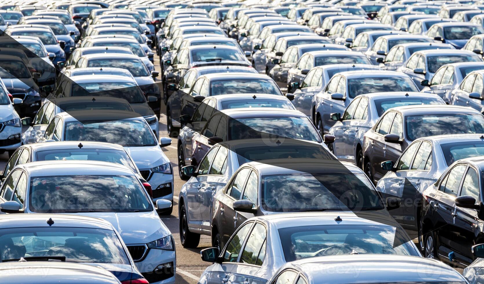 The concept of a decline in car production or prices. Manufacturing crisis or recession crisis in new car sales. photo
