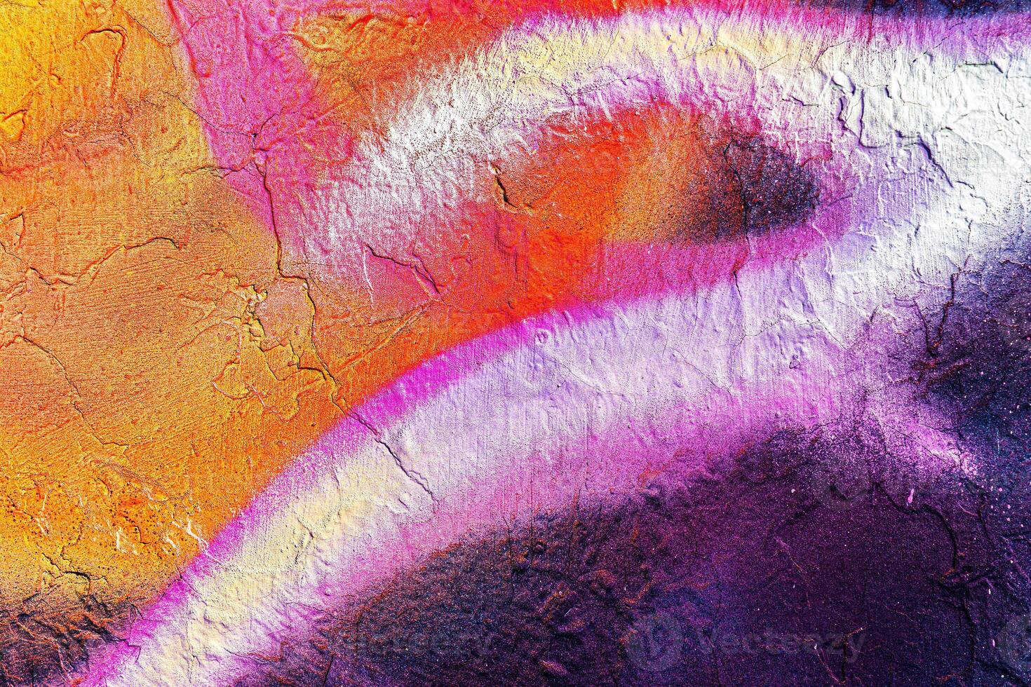 Colorful graffiti painted on a wall. Abstract urban background. photo