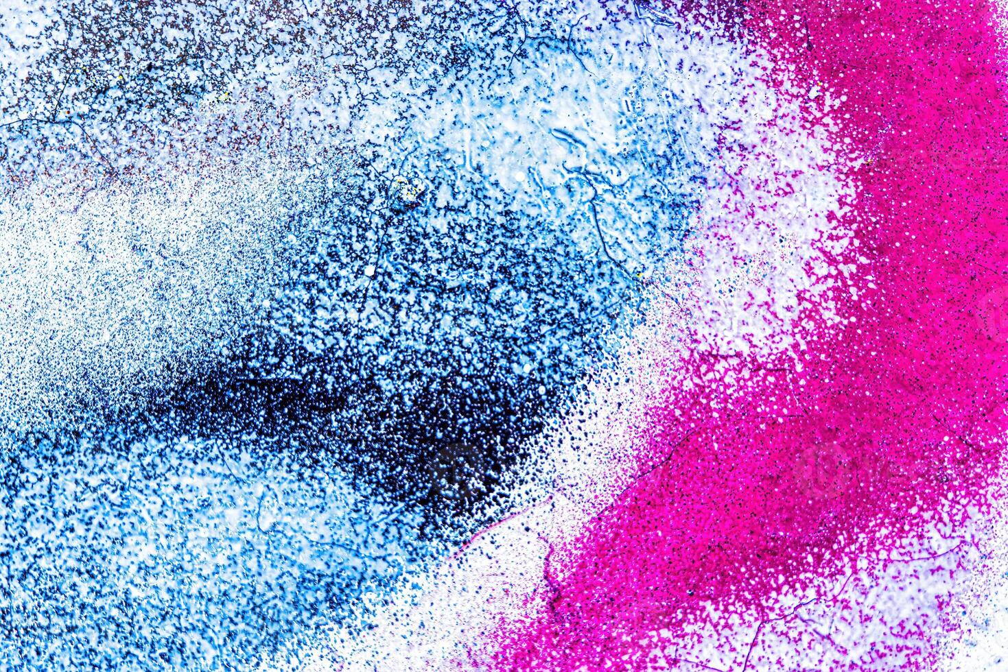 Colorful graffiti painted on a wall. Abstract urban background. photo
