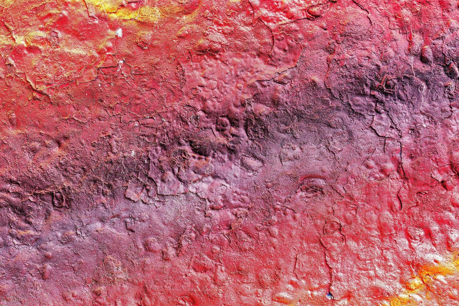 Colorful graffiti painted on a wall. Abstract urban background. Spray painting art. photo