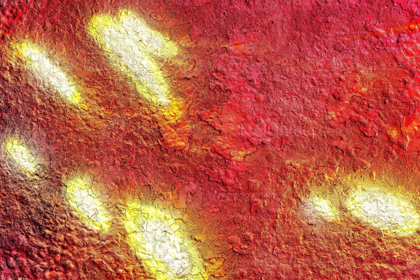 Colorful graffiti painted on a wall. Abstract urban background. Spray painting art. photo