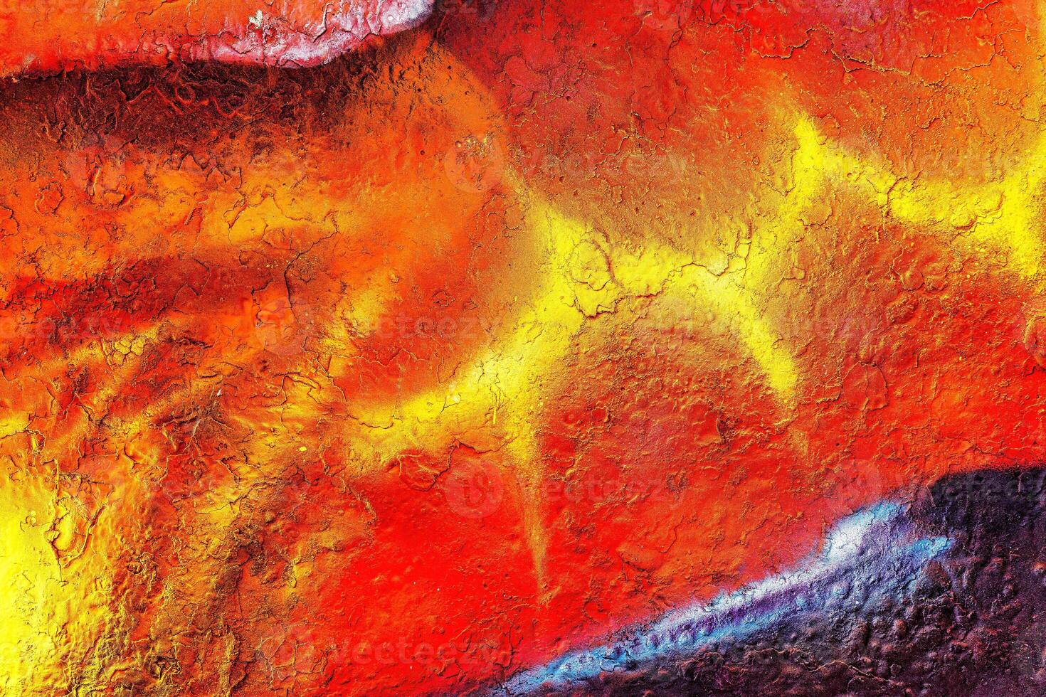 Colorful graffiti painted on a wall. Abstract urban background. Spray painting art. photo