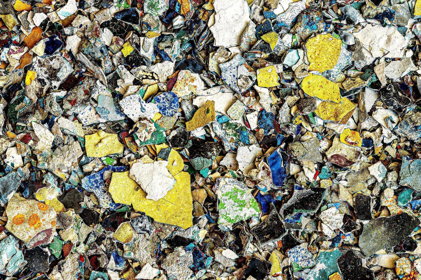 Peeled multi-colored pieces of peeling paint. Abstract background. photo
