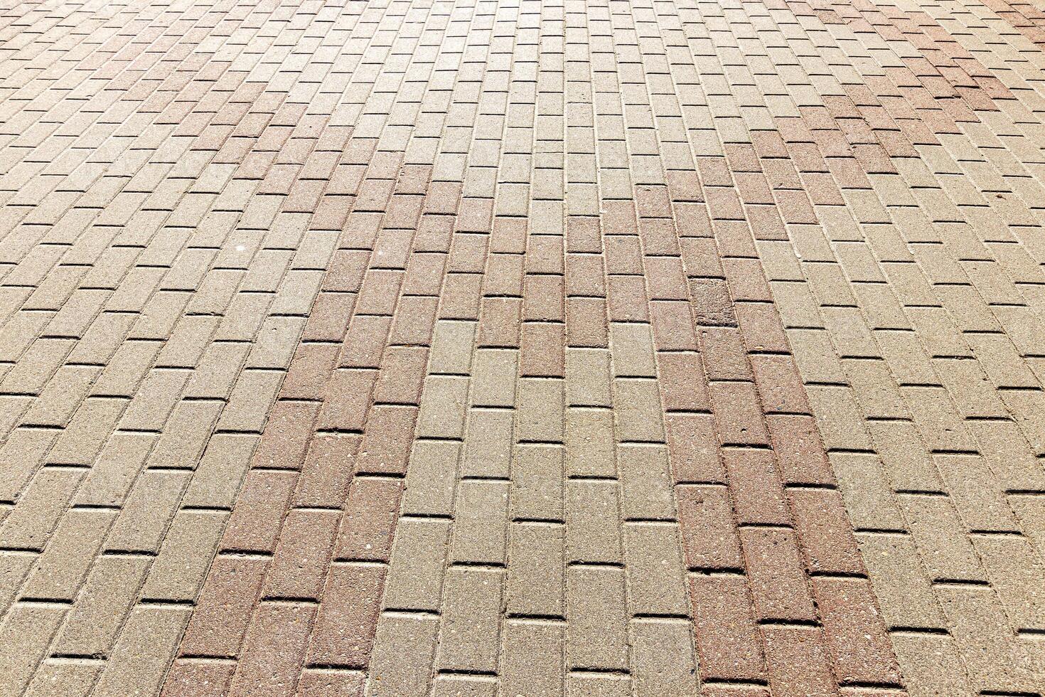 Texture of a paving stone road. Abstract background for design. photo