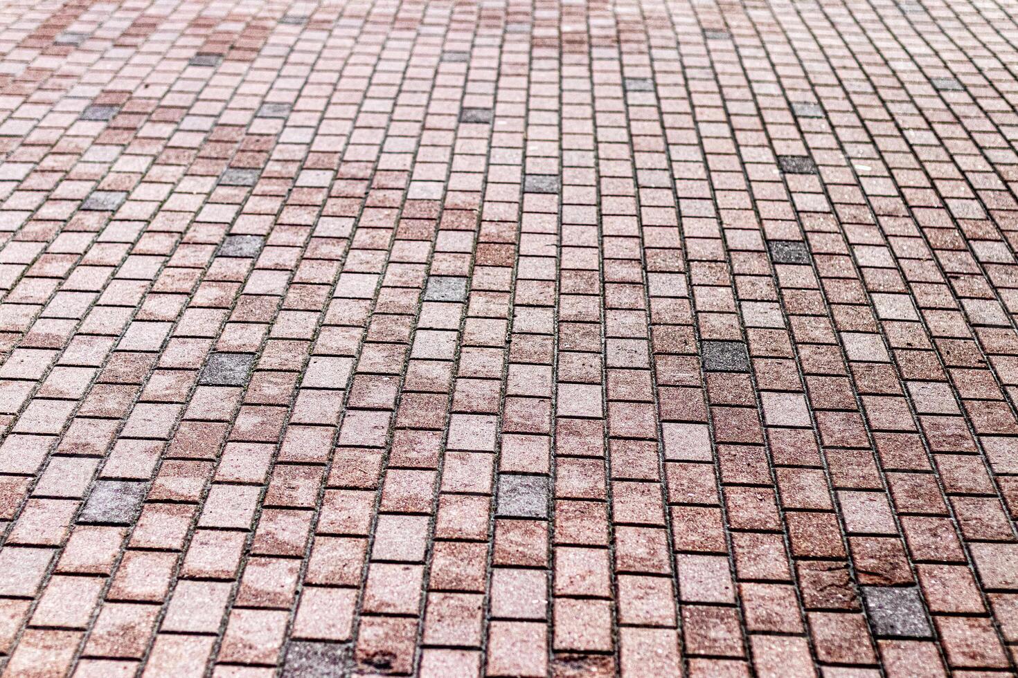 Texture of a paving stone road. Abstract background for design. photo